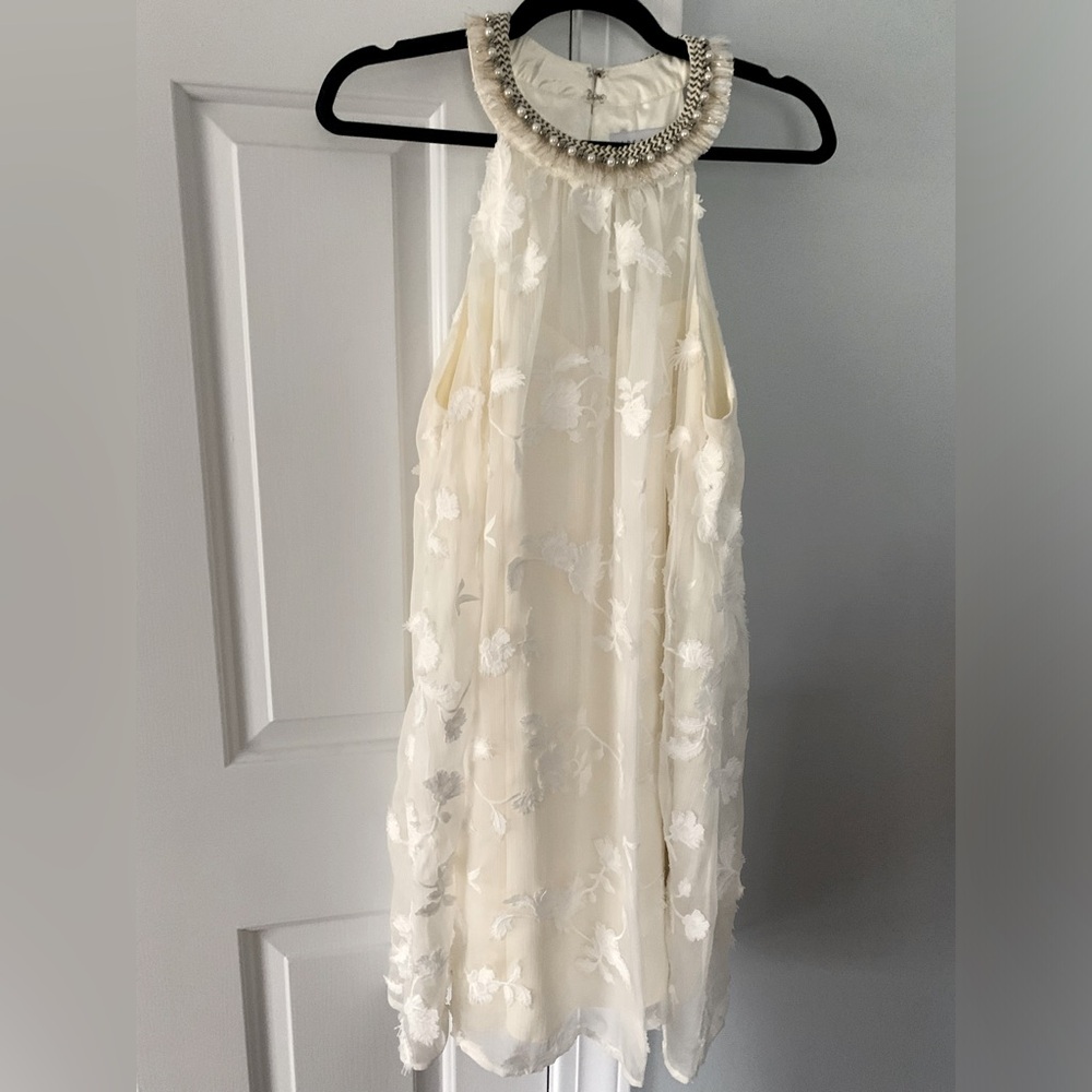 Badley Mischka white sleeveless lace mini dress with jeweled neckline size 8